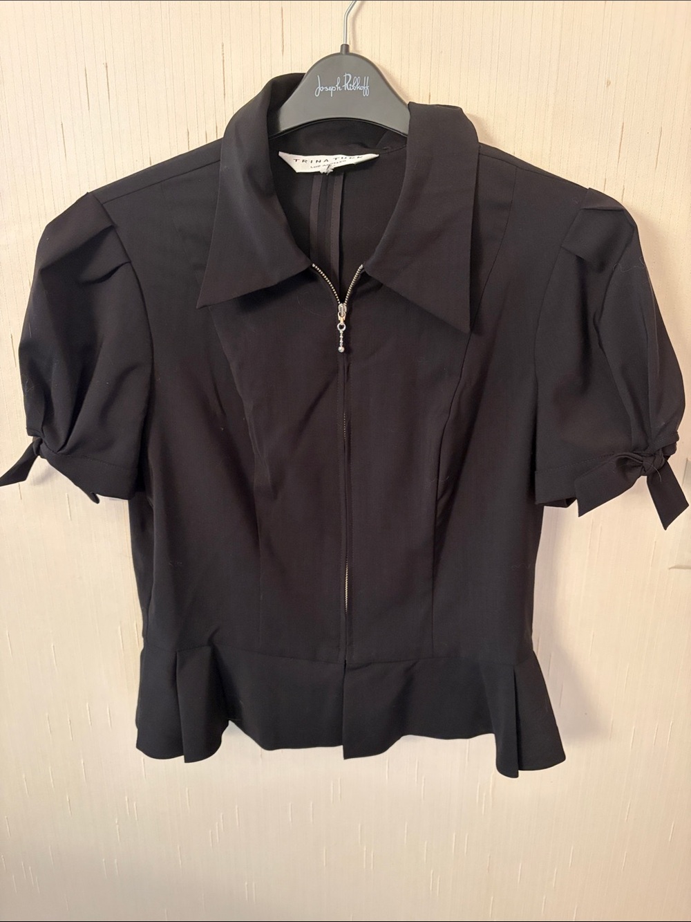 Trina Turk Black Zip-Front Peplum Blouse with Tie Sleeve Details